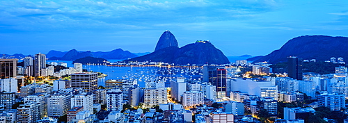 View over Botafogo towards the Sugarloaf Mountain at twilight, Rio de Janeiro, Brazil, South America