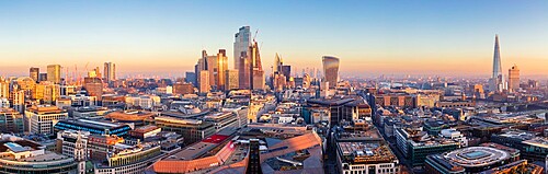 Panoramic aerial view of London City skyline at sunset taken from St. Paul's Cathedral, London, England, United Kingdom, Europe