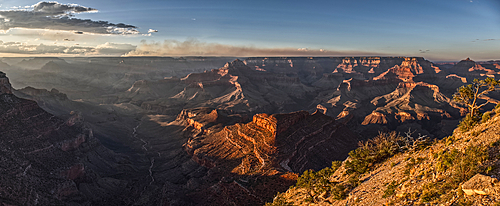 Smoke from the Dragon Bravo wildfire burning on the North Rim of Grand Canyon Arizona. Viewed from Shoshone Point on the South Rim. The fire started from a lightning strike on July 4th, 2025.