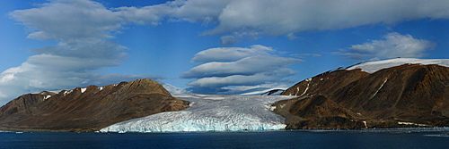 Panorama image of glacier fingers coming down to seashore, Nunavut and Northwest Territories, Canada, North America