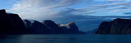 Glacier carved mountain range. Entrance to Sam Ford Fjord