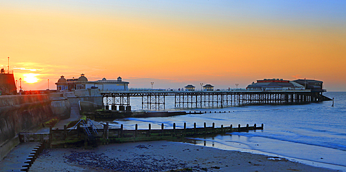 Cromer Pier at sunset, summer evening, Norfolk, England, UK
