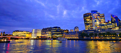 London skyline at dusk from Hays Galleria near London Bridge, London, England, United Kingdom, Europe