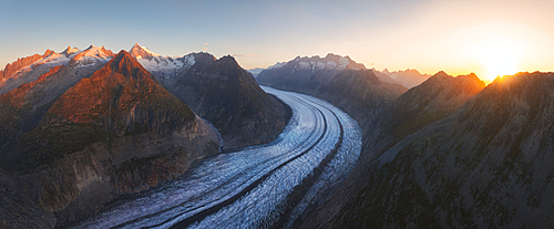Panoramic and aerial view of Aletsch Glacier during sunrise in summer, Riederalp, Oriental Raron, Valais, Switzerland, Europe