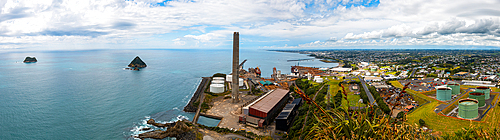 Panorama of the skyline of New Plymouth, viewed from Paritutu Rock showing the industrial port area, New Plymouth, North Island, New Zealand, Pacific