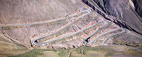Winding mountain road with sharp bends, Purmamarca, Puna, Jujuy, Argentina