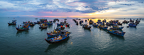 Boats fishing at sunrise in Tam Tien, Quang Nam Province, Central Vietnam