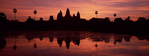 Silhouette and reflections of the temple of Angkor Wat at sunrise, UNESCO World Heritage Site, Angkor, Siem Reap Province, Cambodia, Indochina, Southeast Asia, Asia