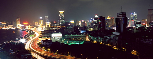 Elevated night view of the Bund (Zhongshan Dong Yilu), river and new city skyline, Shanghai, China, Asia