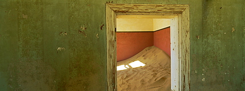 Interior of German house in the deserted mining town of Kolmanskop in the Restricted Diamond area on the south west coast, near the town of Luderitz, Namibia, Africa