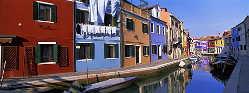 Panoramic view of canal, colourful houses and reflections, Burano, Venice, Veneto, Italy, Europe