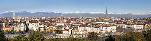 Panoramic cityscape shows Mole Antonelliana and Alps, Turin, Piedmont, Italy, Europe