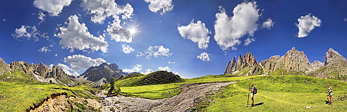 360Â¬âˆž panoramic view of the Geisler Mountains, two hikers walking near Mittagsscharte gorge, Puez-Geisler Nature Park, province of Bolzano-Bozen, Italy, Europe