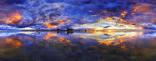 360 x 170 panorama with glorious sunset at Carters Beach, cloudy sky, Water Reflection, Westport, West Coast, Southland, New Zealand, Oceania