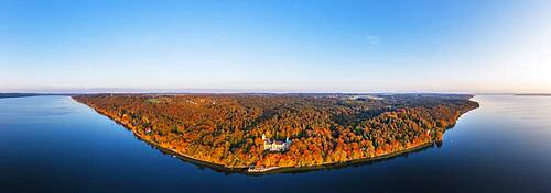 Panorama, Seeburg Castle at Lake Starnberg in the evening light, near Muensing, autumnal mixed forest, Fuenfseenland, aerial view, Upper Bavaria, Bavaria, Germany, Europe