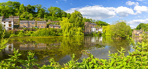 View of reflections in Cromford pond, Cromford, Derbyshire Dales, Derbyshire, England, United Kingdom, Europe