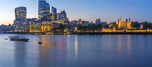 View of the Tower of London, River Thames and City of London at dusk, London, England, United Kingdom, Europe