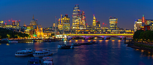 View of Blackfriars Bridge over the River Thames, St. Paul's Cathedral and The City of London skyline at dusk, London, England, United Kingdom, Europe