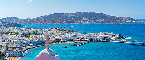 Elevated view of hilltop chapel, flour mills and town, Mykonos Town, Mykonos, Cyclades Islands, Greek Islands, Aegean Sea, Greece, Europe