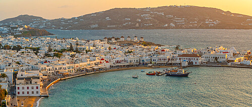 View of town from elevated view point at sunset, Mykonos Town, Mykonos, Cyclades Islands, Greek Islands, Aegean Sea, Greece, Europe