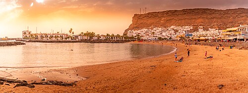 View of Puerto de Mogan beach and town at golden hour, Playa de Puerto Rico, Gran Canaria, Canary Islands, Spain, Atlantic, Europe