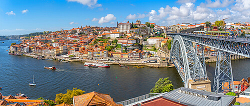 View of the Dom Luis I bridge over Douro River and terracota rooftops, UNESCO World Heritage Site, Porto, Norte, Portugal, Europe