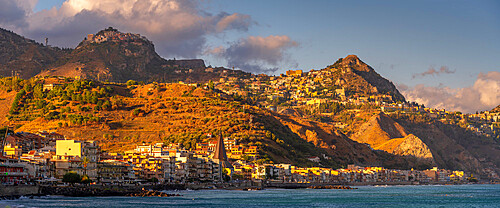 View of Castelmola, Taormina and Giardini Naxos viewed from Giardini Naxos beach, Sicily, Italy, Mediterranean, Europe