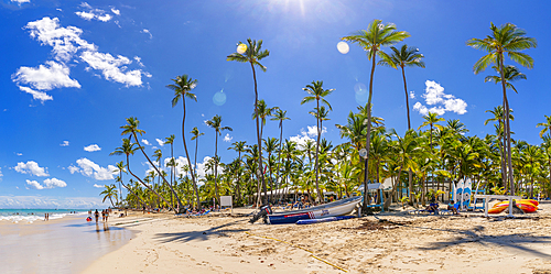 View of palm trees and sea at Bavaro Beach, Punta Cana, Dominican Republic, West Indies, Caribbean, Central America