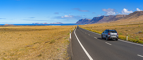 View of landscape and road towards Caleta de Famara, Caleta de Famara, Lanzarote, Las Palmas, Canary Islands, Spain, Atlantic, Europe