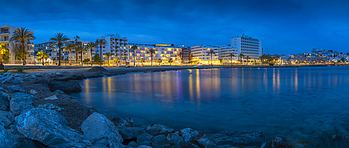 View of Platja de ses Figueretes Beach at dusk, Ibiza Town, Ibiza, Balearic Islands, Spain, Mediterranean, Europe