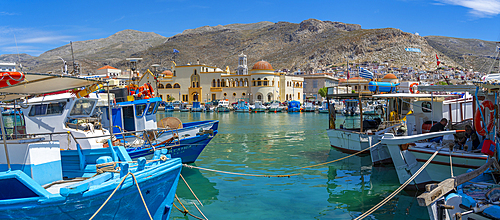 View of harbour boats in Kalimnos with hills in the background, Kalimnos, Dodecanese Islands, Greek Islands, Greece, Europe