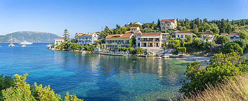 View of hotels overlooking Fiscardo harbour, Fiscardo, Kefalonia, Ionian Islands, Greek Islands, Greece, Europe