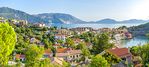 Elevated view of harbour and colourful houses in Assos, Assos, Kefalonia, Ionian Islands, Greek Islands, Greece, Europe