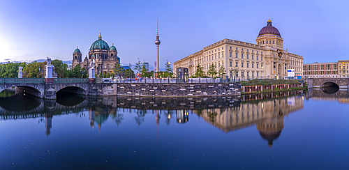 View of Berliner Dom, Berliner Fernsehturm and Humboldt Forum reflecting in River Spree at dusk, Berlin, Germany, Europe