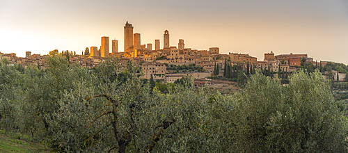 View of San Gimignano skyline at sunset, San Gimignano, Province of Siena, Tuscany, Italy, Europe