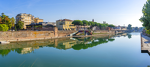 View of buildings and reflections on the Rimini Canal, Rimini, Emilia-Romagna, Italy, Europe