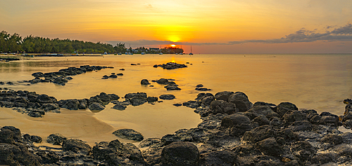 View of beach and Indian Ocean at sunset in Cap Malheureux, Mauritius, Indian Ocean, Africa