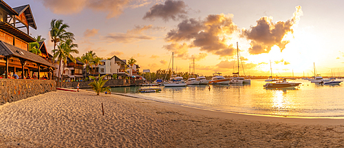 View of beach and boats in Grand Bay at golden hour, Mauritius, Indian Ocean, Africa