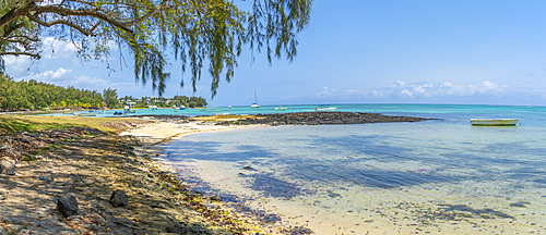 View of beach and turquoise Indian Ocean on sunny day in Cap Malheureux, Mauritius, Indian Ocean, Africa