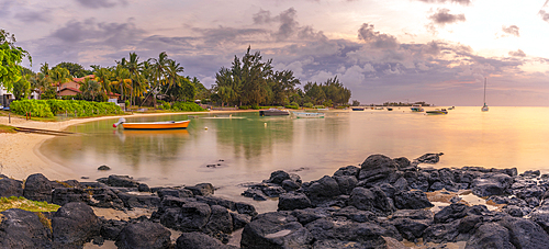 View of beach and Indian Ocean at sunset in Cap Malheureux, Mauritius, Indian Ocean, Africa