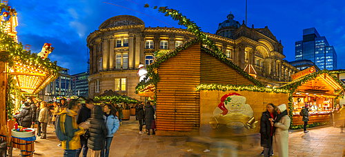 View of Christmas Market stalls in Victoria Square at dusk, Birmingham, West Midlands, England, United Kingdom, Europe