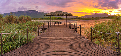 View of Jet lake and Ubombo Mountain from Ghost Mountain Inn at sunrise, Mkuze, KwaZulu-Natal Province, South Africa, Africa