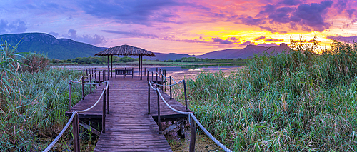 View of Jet lake and Ubombo Mountain from Ghost Mountain Inn at sunrise, Mkuze, KwaZulu-Natal Province, South Africa, Africa