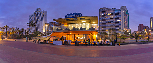 View of promenade restaurant and hotels from New Pier at dusk, Durban, KwaZulu-Natal Province, South Africa, Africa