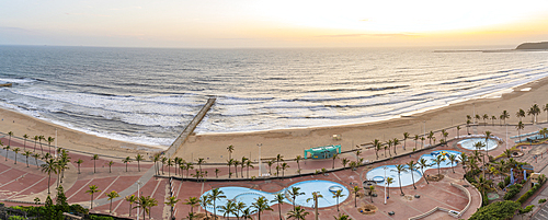 Elevated view of beaches, promenade and Indian Ocean at sunrise, Durban, KwaZulu-Natal Province, South Africa, Africa