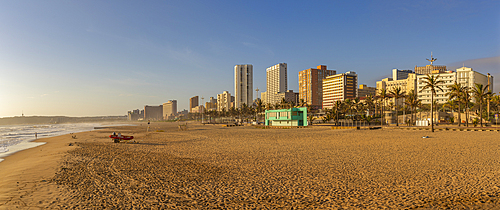 View of promenade, beach and hotels from pier in Indian Ocean at sunrise, Durban, KwaZulu-Natal Province, South Africa, Africa