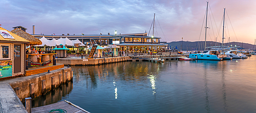 View of golden sunset, boats and restaurants at Knysna Waterfront, Knysna, Western Cape Province, South Africa, Africa