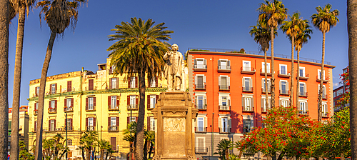 View of Nicola Amore statue and colourful architecture in Piazza della Vittoria, Naples, Campania, Italy, Europe