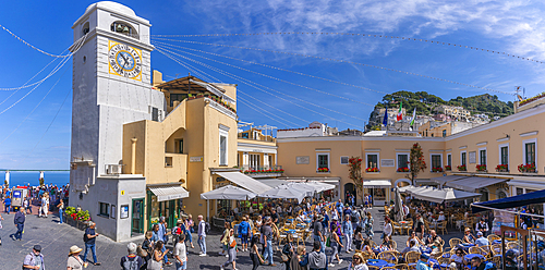 View of Clock Tower and cafes in Piazza Umberto I (La Piazzetta), Capri Town, Isle of Capri, Bay of Naples, Campania, Italy, Mediterranean, Europe