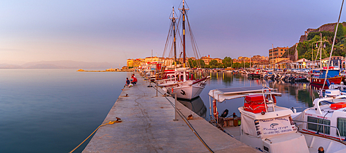 View of boats in the Old Port Marina at sunset, Corfu, Ionian Sea, Greek Islands, Greece, Europe